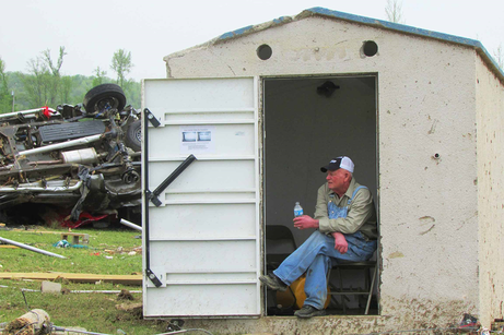 Tornado Survivor in a Storm Shelter
